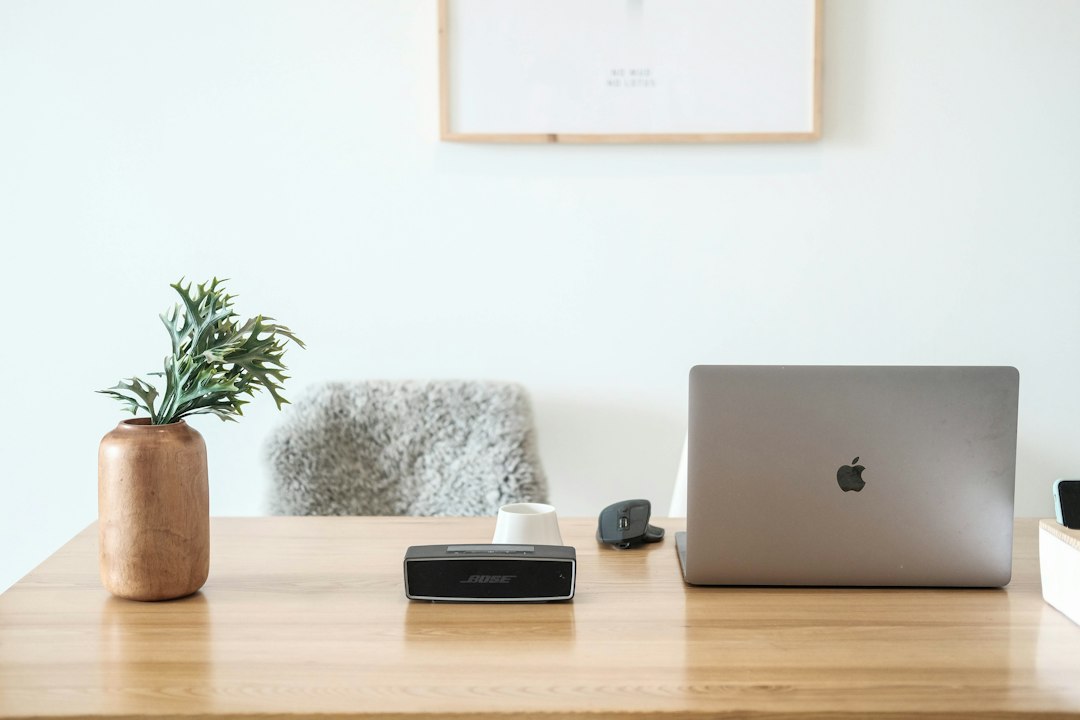 Modern home office desk with laptop for workspace and productivity